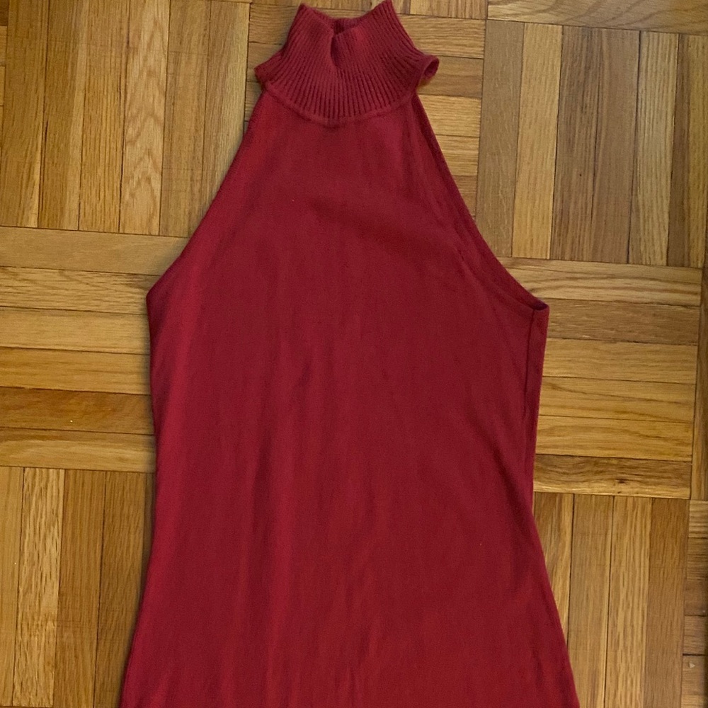 Sleeveless sweater dress with turtleneck.